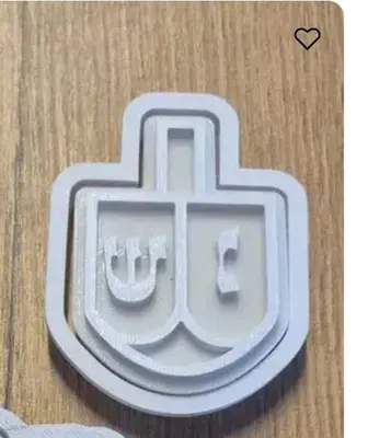 חותכן סביבון  עם ידית להטבעה נוחה